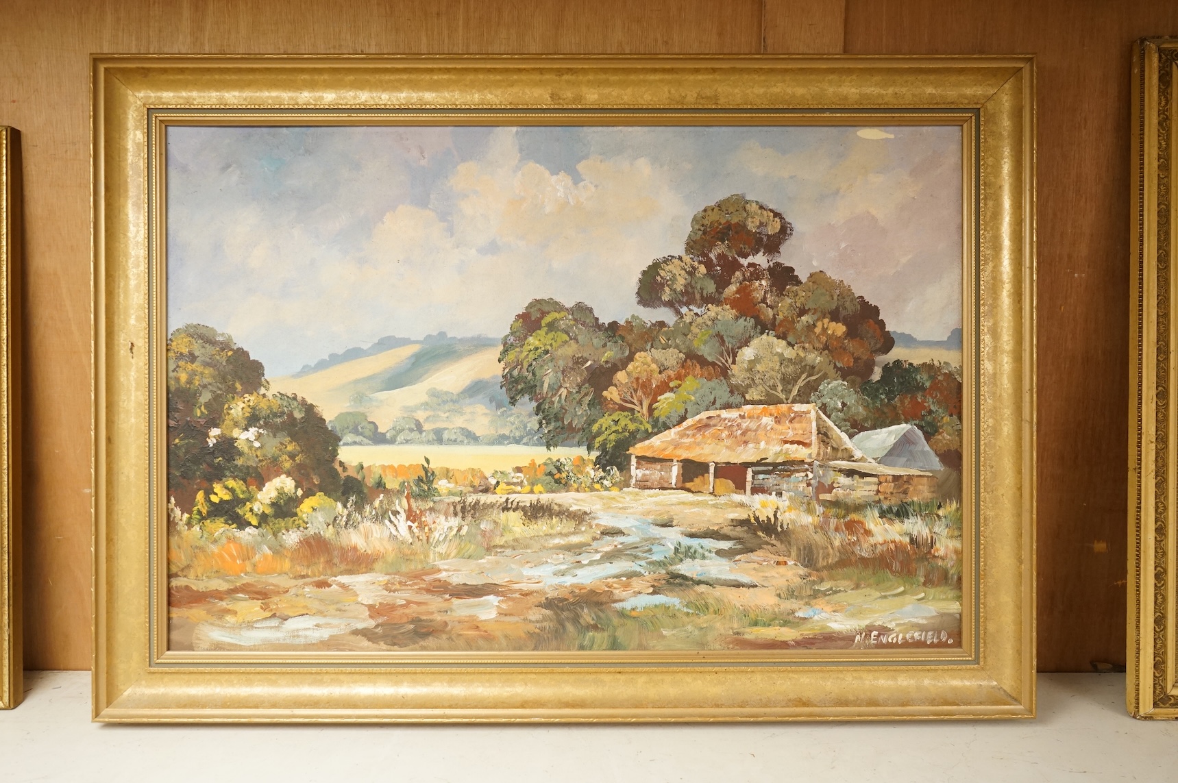 Nicholas Englefield (20th. C), Landscape with outbuildings, signed, oil on canvas board, 49 x 74cm